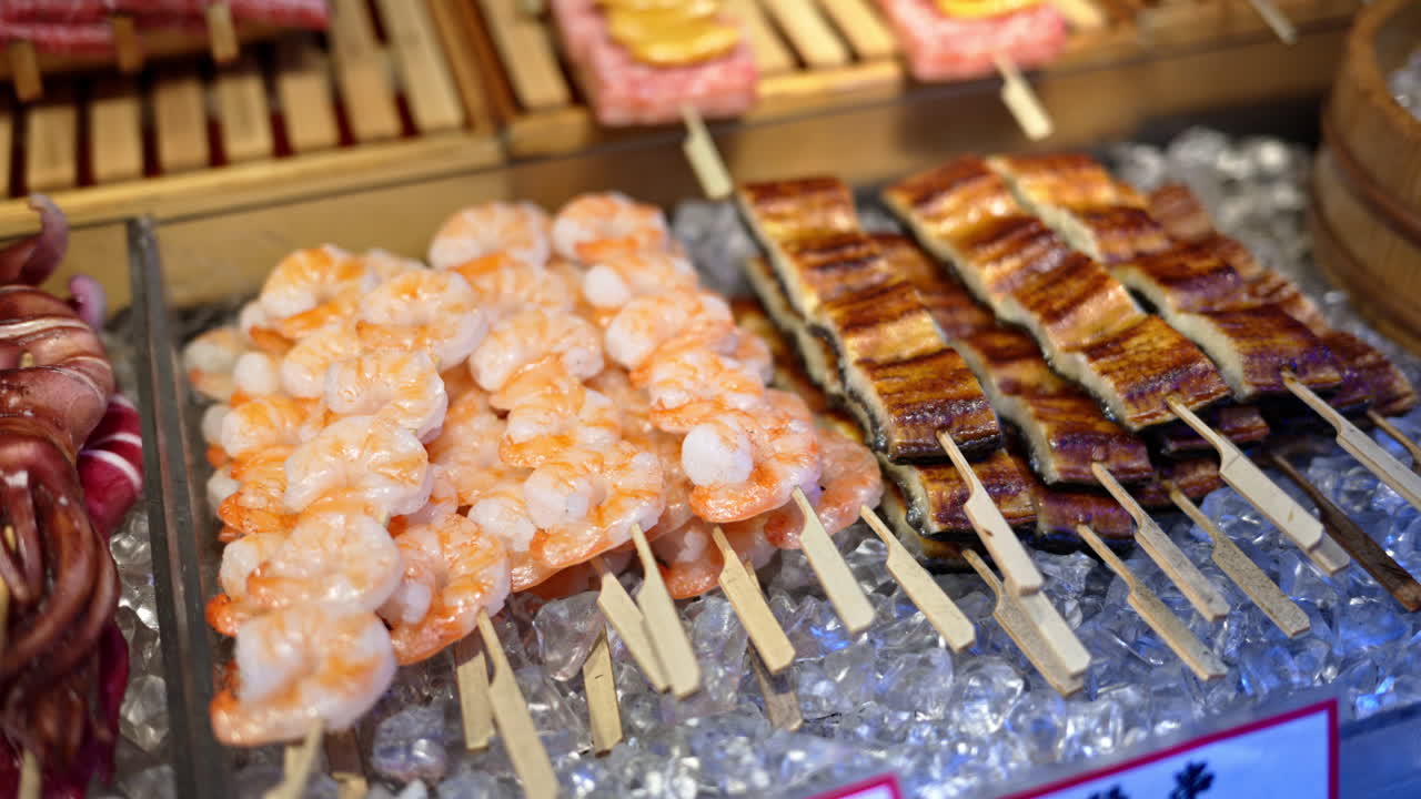 Close up of prawns on skewers at the Tsukiji Fish Market in Chuo, Tokyo, Japan