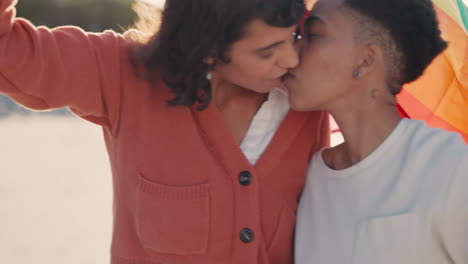 lgbt, lesbian and couple kiss with flag for women