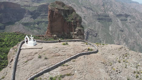beautiful aerial shot in orbit over the roque palmes and spotting the cross that is nearby
