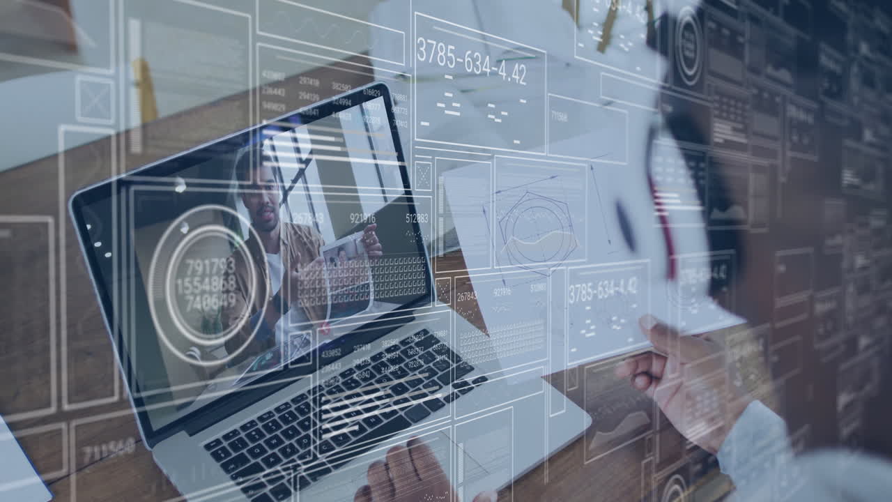 Holding paper with digital data, person in school video call on laptop screen