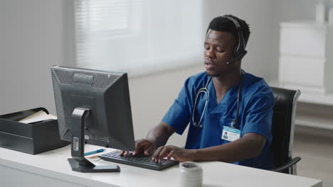 black male doctor having headache. portrait of a man doctor tired at work. doctor is tired after work day and has headache