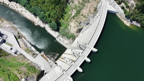 magnificent white structure of the ribeiradio dam in portugal - aerial shot