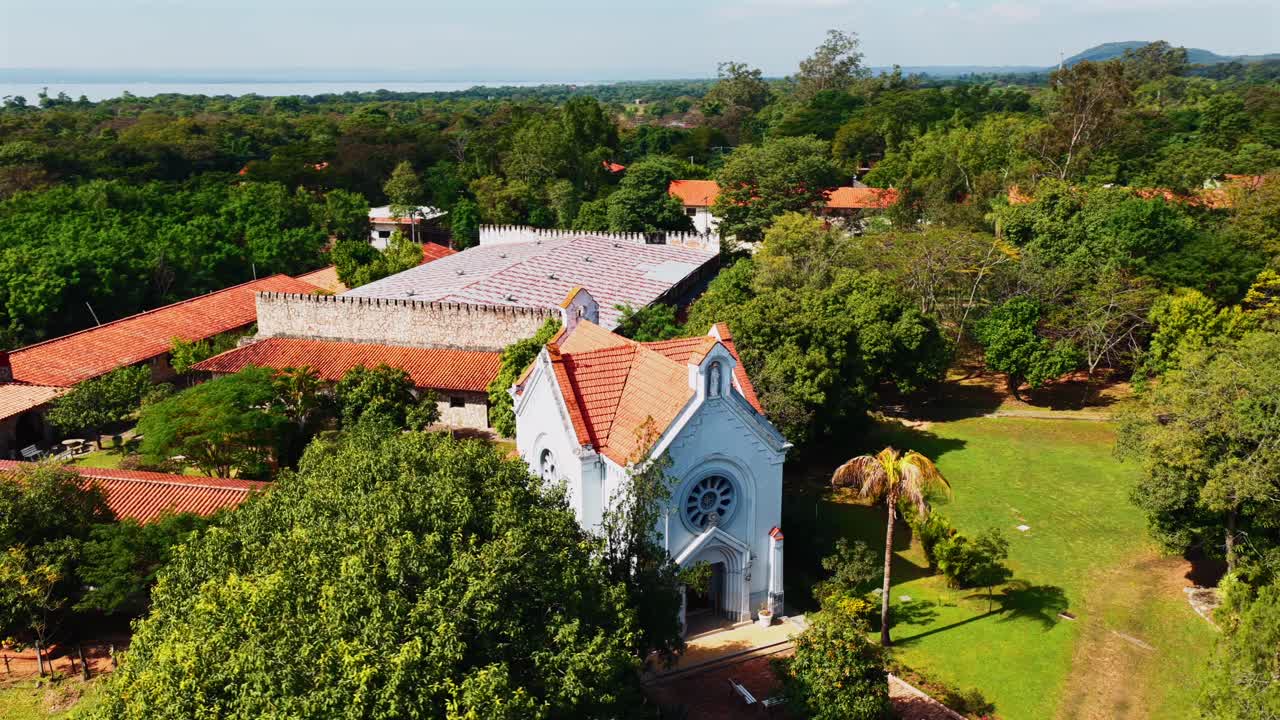 Aerial drone view of monastery chapel near Castillo Carlota Palmerola in Areguá, Paraguay