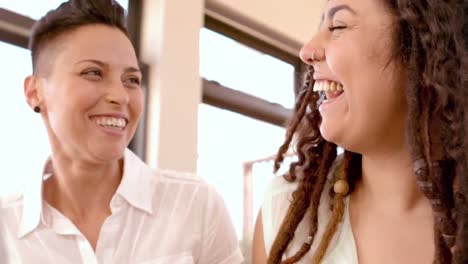 happy lesbian couple laughing