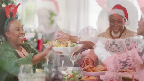 happy african american family having christmas dinner