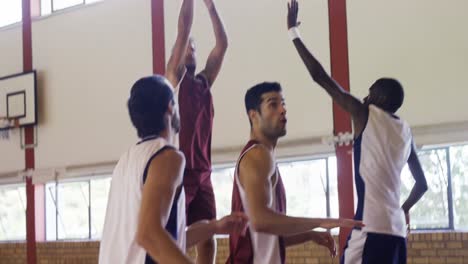 basketball players playing in the court
