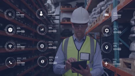 animation of icons with data processing over caucasian male worker using tablet in warehouse