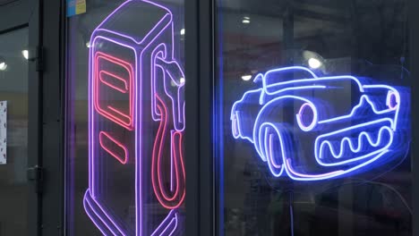 astronaut bright led sign. car in the gas station neon blue sign