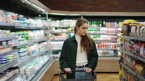 a portrait of a woman in a supermarket pushing trolley