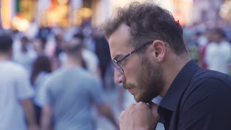 young man in distress, thinking.