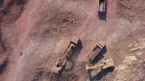 Commercial excavator surface mining, Concept of environmental destruction impact showing quarry landscape with heavy industry machinery dust filling the air, deforested landscape affecting environment
