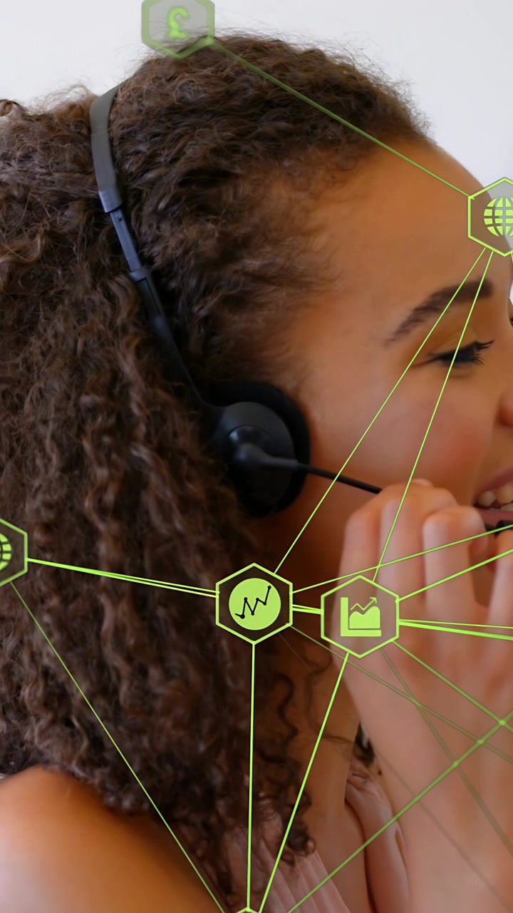 Vertical video: Call agent responding to call, helping caller while neon overlay tracking face