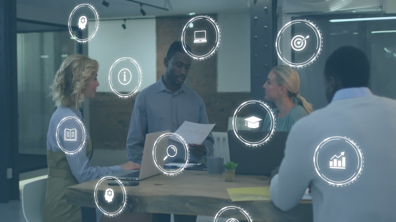 Animation of icon in circles over diverse coworkers discussing reports in office