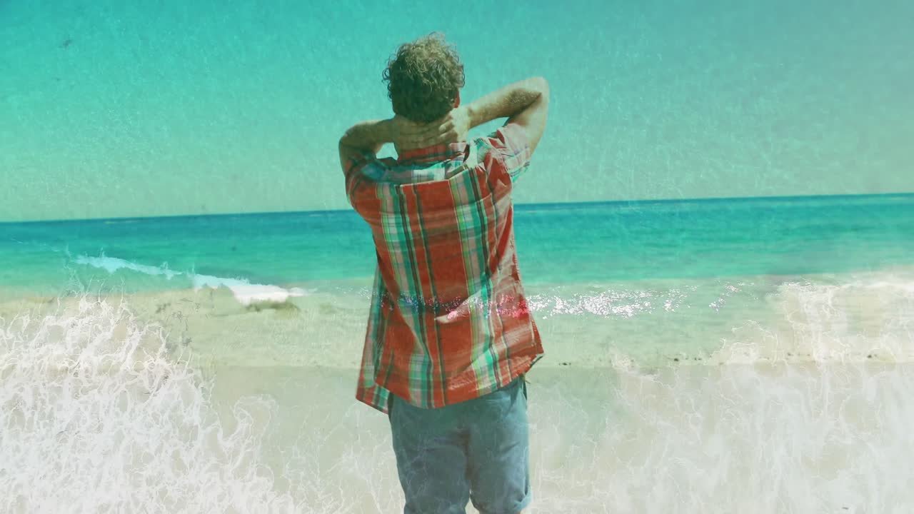 Man celebrating on the beach 4k