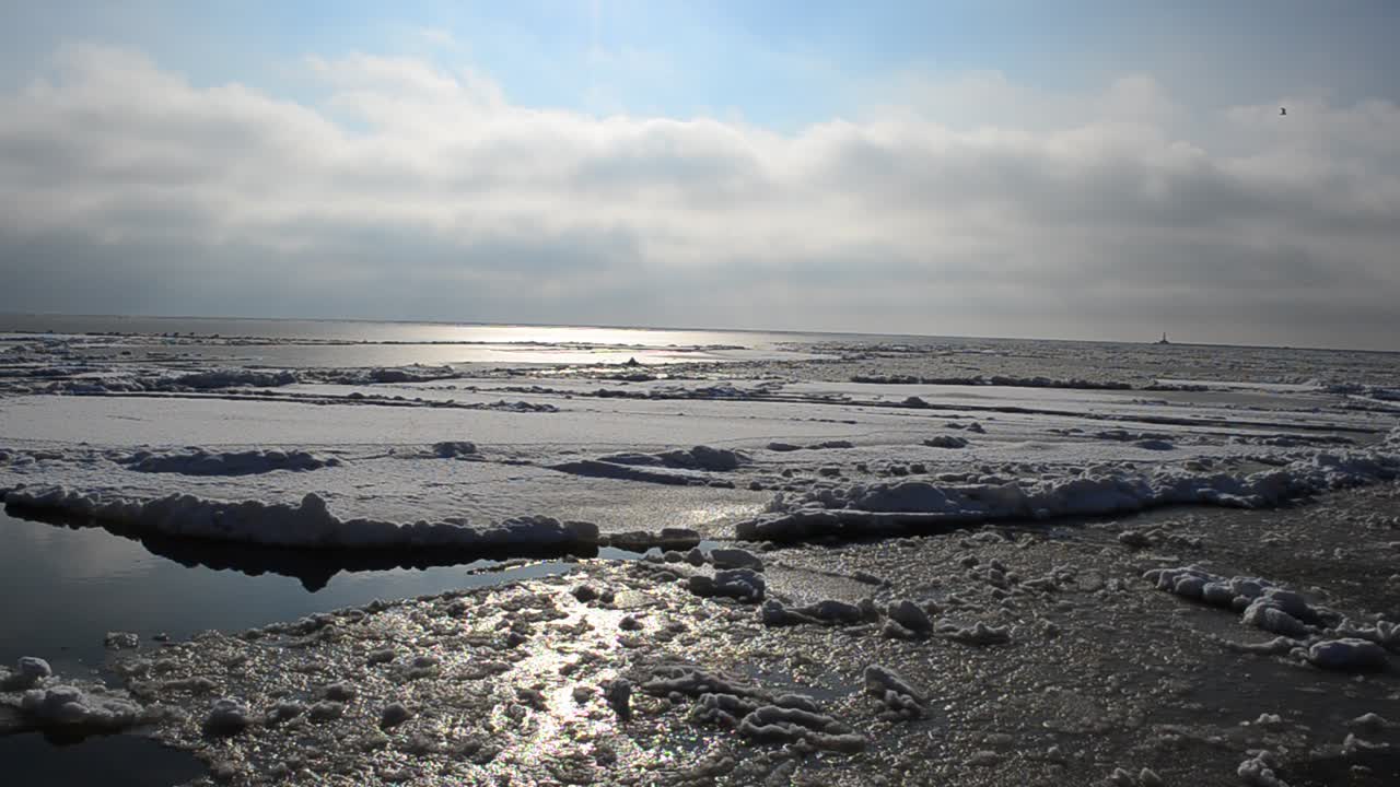 Ice floes in the sea. Sea landscape in the winter