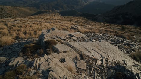 tilt up shot of beautiful velefique mountains during sunny day in summer during hiking trip in spain