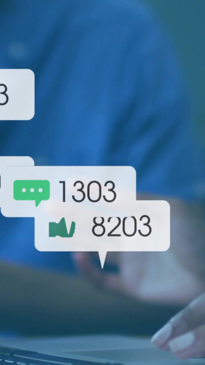 Vertical video: Hands typing while incoming marketing bubbles floating over hands, tracking metrics