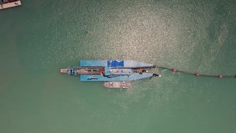 top-down view of a sand dredging vessel in the gulf of mexico