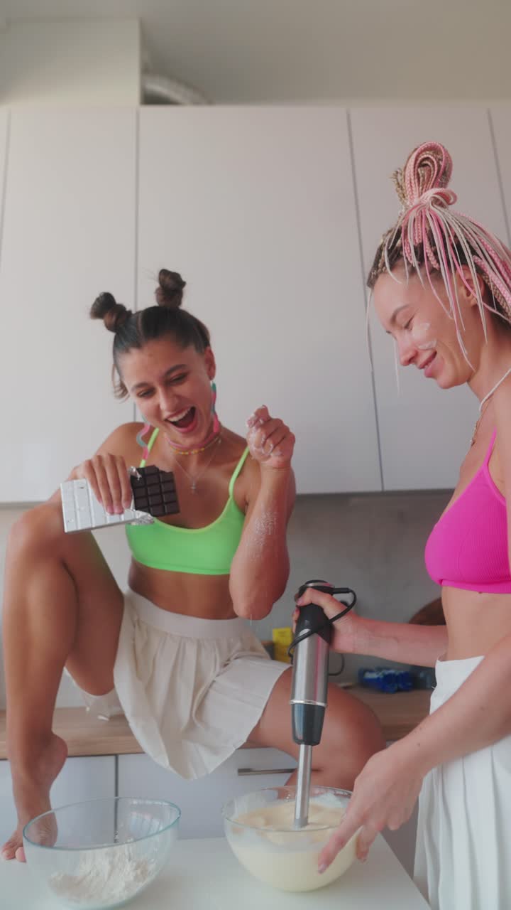 Two women cooking in the kitchen