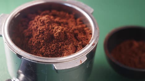 ground coffee in a portafilter for espresso
