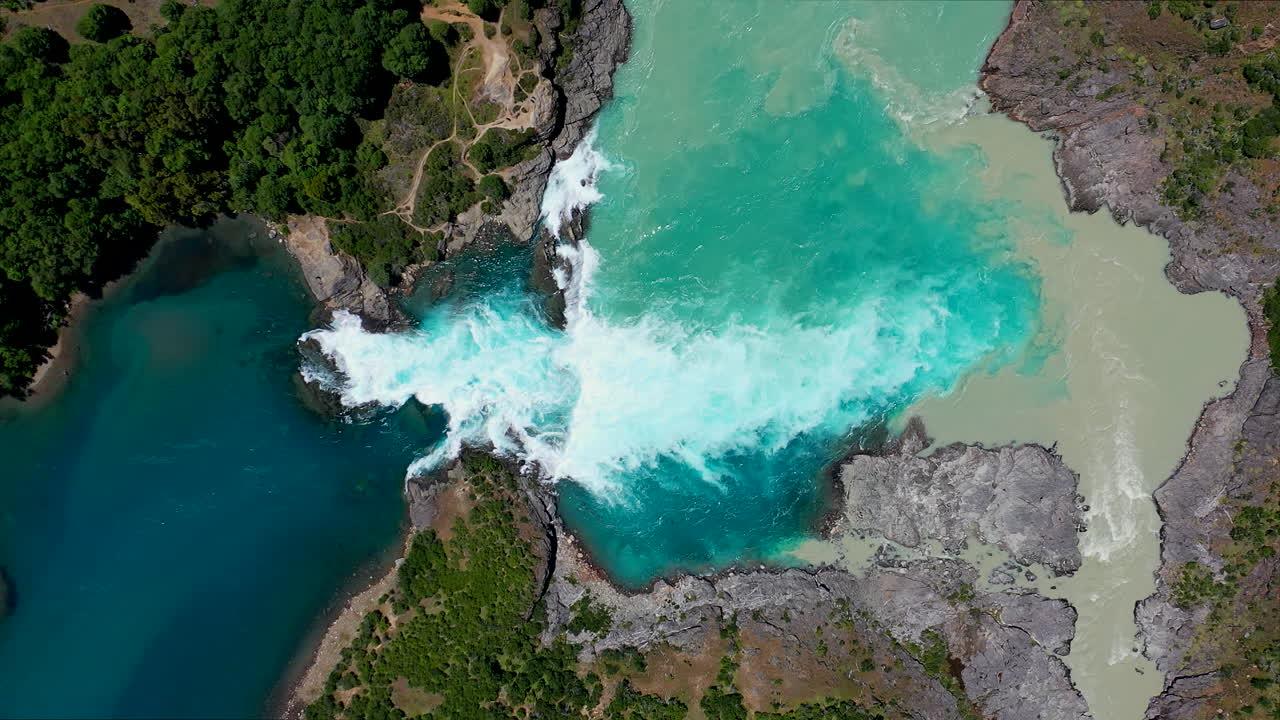 Bird's view Static Waterfall Rio Baker Chili Aisen Carretera Australe Blue and Brown Scum Waters surrounded Forrest