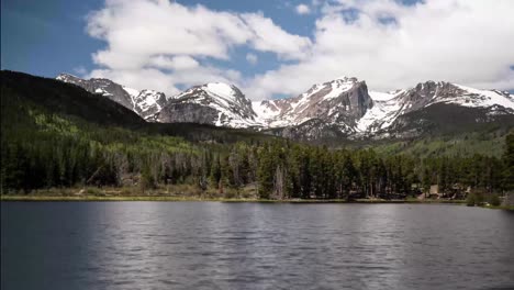 4k clouds passing over a mountain time lapse