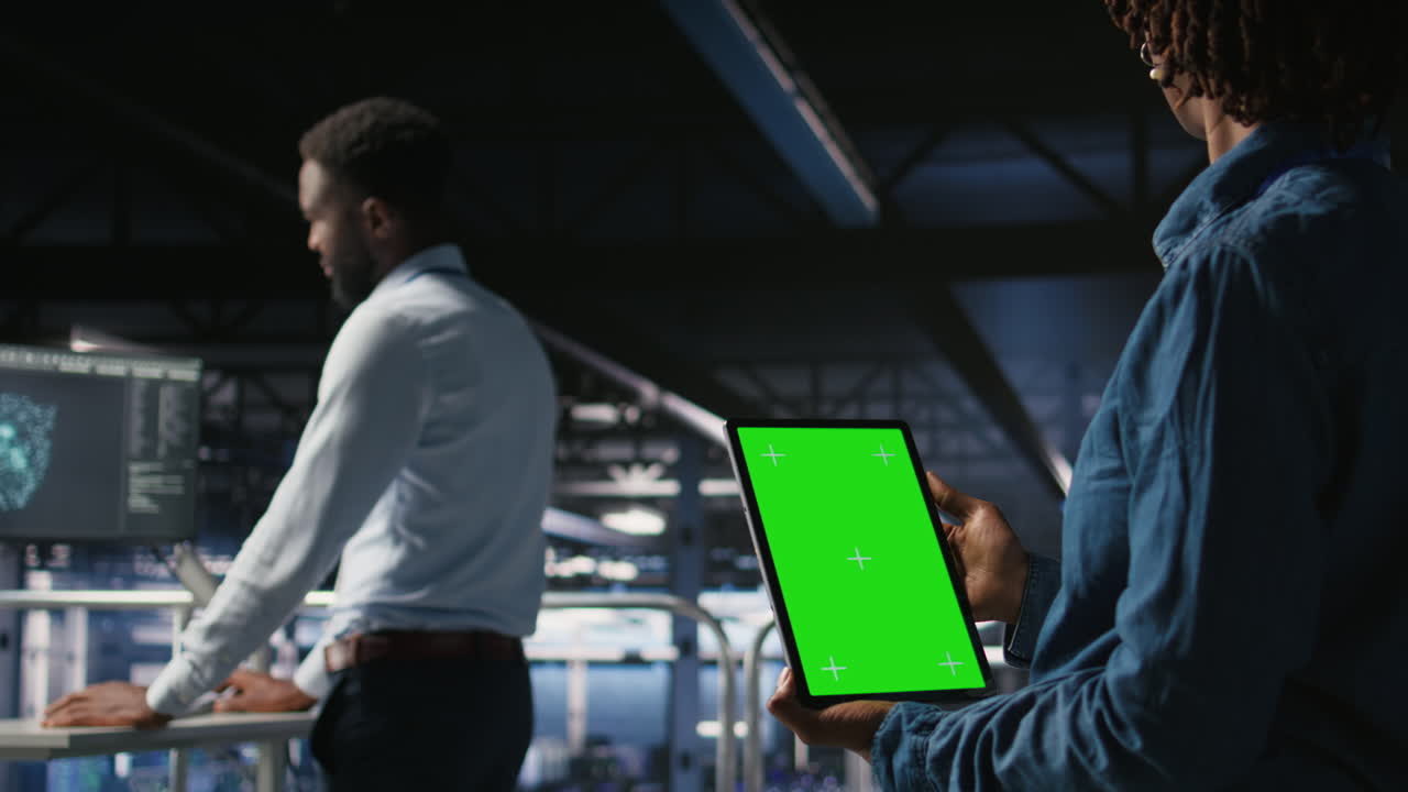 Computer scientists in data center monitoring neural network LLM visualization