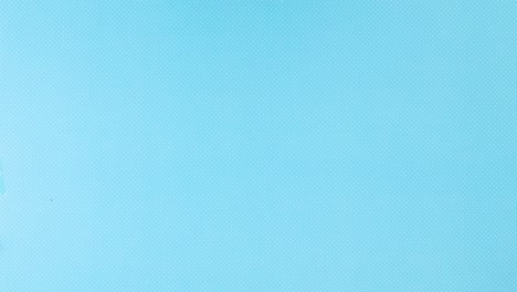 las frutas tropicales aparecen en el lado izquierdo del tema azul. detenga el movimiento