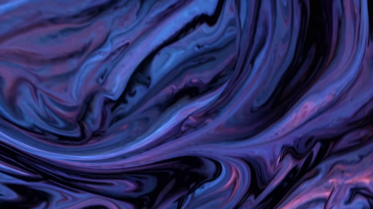 Vivid, swirling abstract patterns in shades of blue and purple create a mesmerizing visual effect. The fluid motion and vibrant colors evoke a sense of energy and creativity