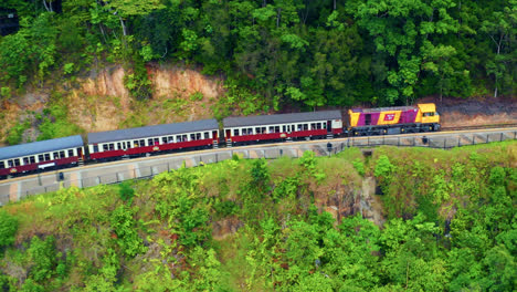 Kuranda-Scenic-Railway-At-Red-Bluff-Cairns-North-Queensland-Australia---aerial-drone-shot