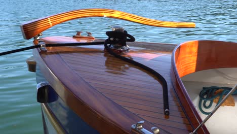 a beautiful boat parked on a river where you can see the art