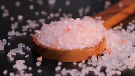 himalayan pink salt in a wooden is used to flavor food. due mainly to marketing costs, pink himalayan salt is up to twenty times more expensive than table or sea salt.