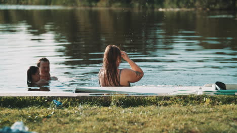 friends enjoying a summer day at the lake