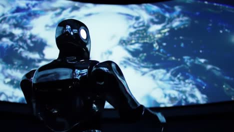 A robot stands in front of a large screen showcasing a captivating view of Earth from space. The display highlights technological advancements at an exhibition event.