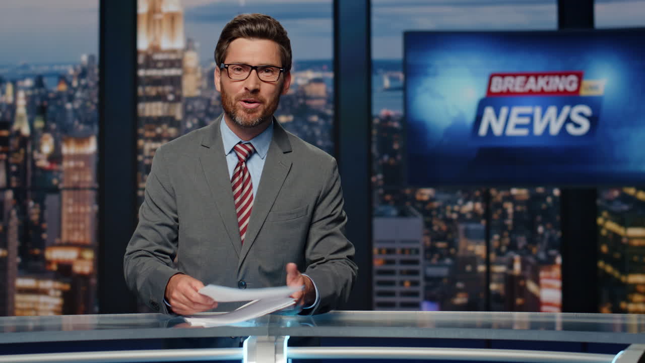 News anchorman ending tv program at evening studio closeup. Man saying goodbye