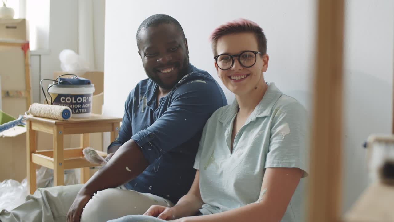 Couple Painting Their New Home