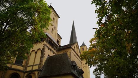 Sandstone-monastery-in-Germany-between-trees