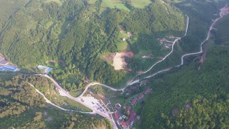 small village outside of novi pazar in serbia europe on a sunny evening, aerial bird view