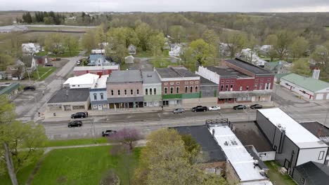 Camden,-Michigan-downtown-with-drone-video-moving-forward-from-the-side