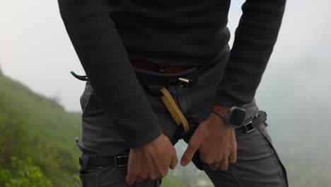A Man Wearing a Harness For Safety While Trekking Mount Grignetta in Lombardy, Italy - Close Up