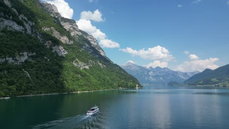 drone captures stunning switzerland tourism cruise boat ride surrounded by breathtaking natural beauty