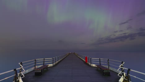 a timelapse of the aurora storm 10th may 2024 on saltburn pier in saltburn-by-the-sea, england