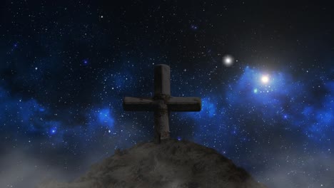 cruz de piedra con estrellas nocturnas en el fondo