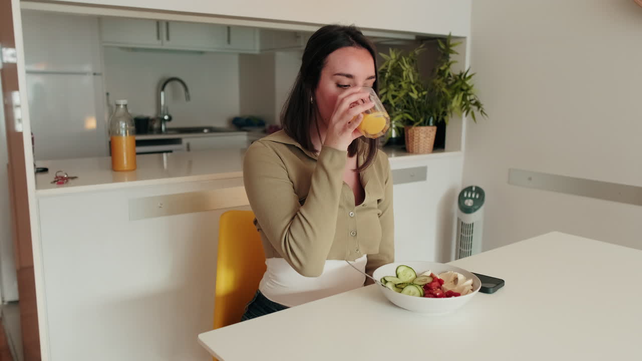 Woman Eating Healthy Breakfast at Home