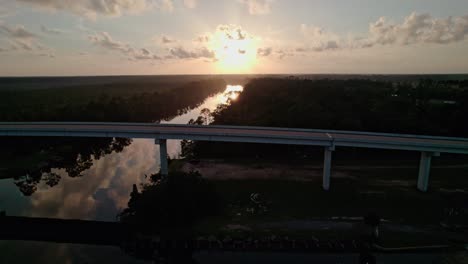 aerial trucking shot alongside of highway 71 intracoastal waterway bridge in florida