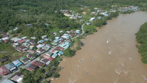drone view at lundu town during summer, in conjunction of regatta traditional long boat race batang kayan river, with car and bike show.
#regatta