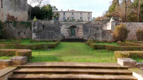 Historic-Chateau-de-Bocaud-Jacou-Grand-Stairs,-France---Aerial-fly-in