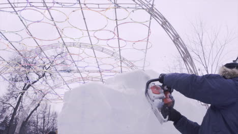 ice carving under colorful light structure