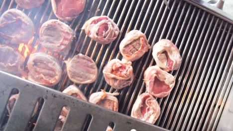 grilled mignon steak while the smoke covers the camera lens