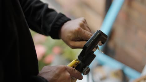 An electrician installing an inverter in a home. The image shows technical skill, modern tools, and attention to safety in electrical work